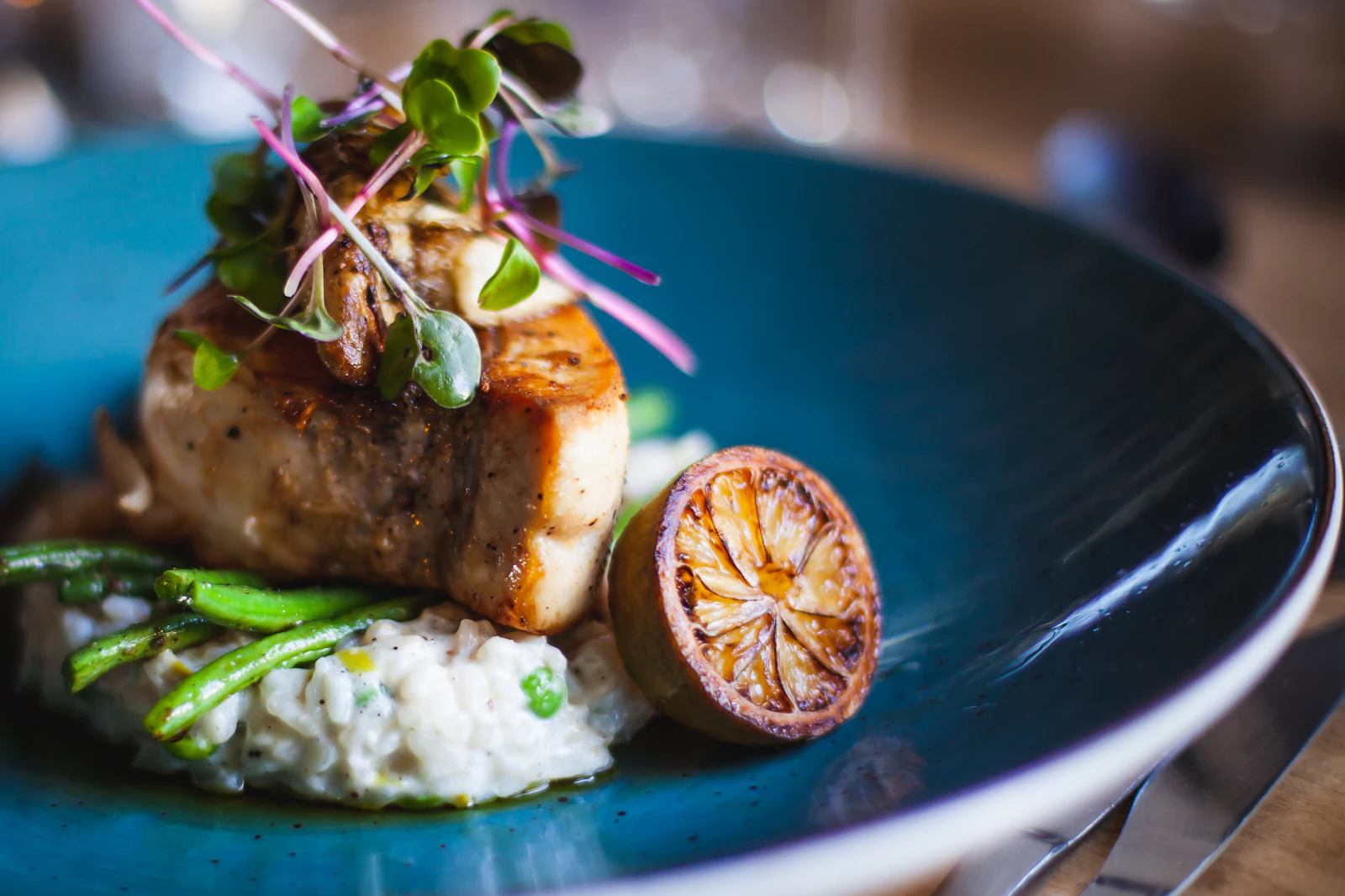 A seasonal dish served on a dark plate