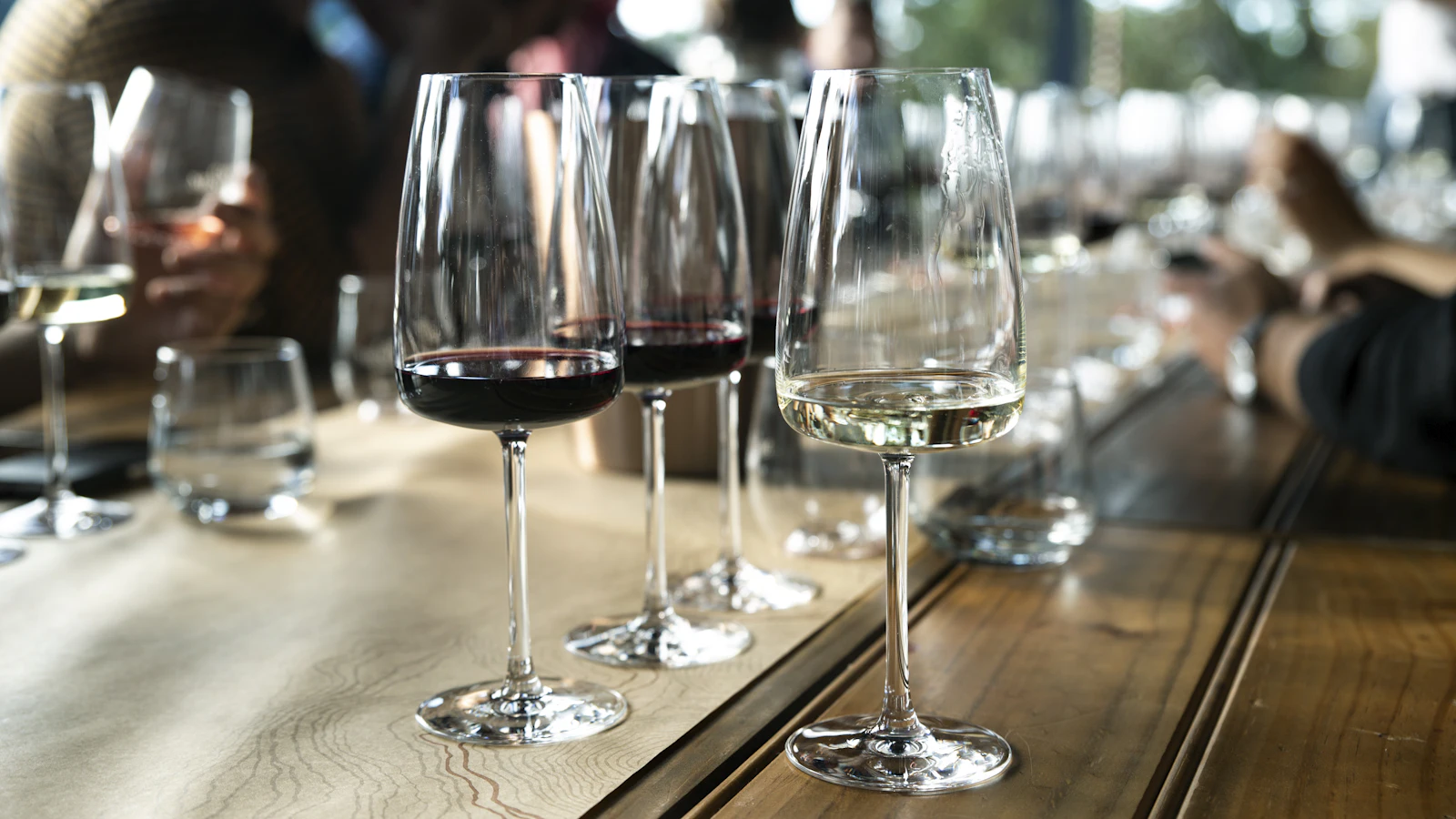 Glasses of red wine on the bar